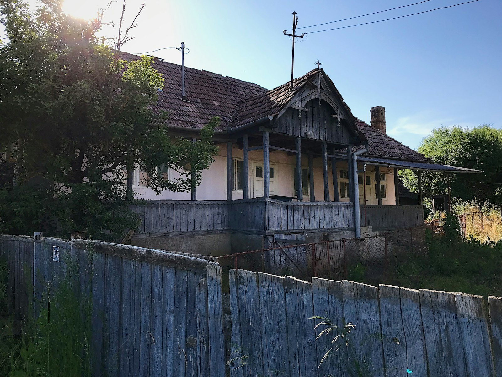 Older weatherboard house with signs of wear and potential major defects